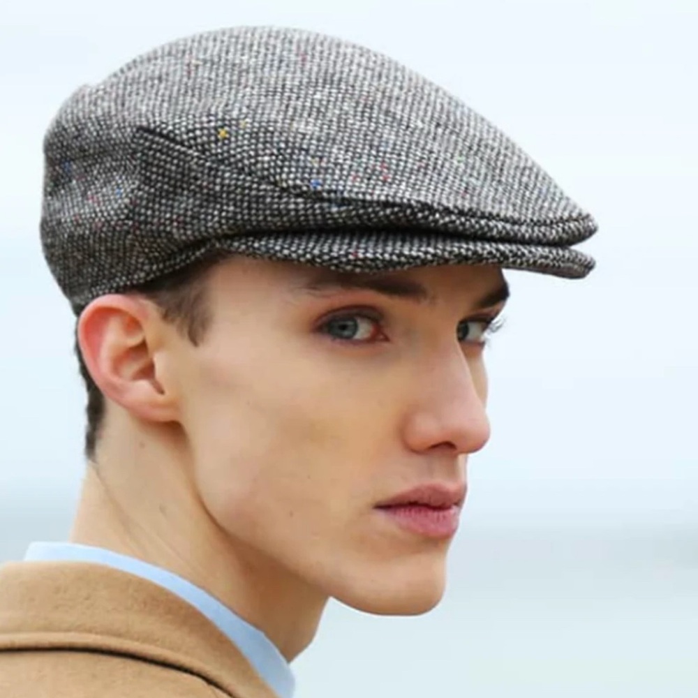 Man of aran woollen flat cap with green shamrock
